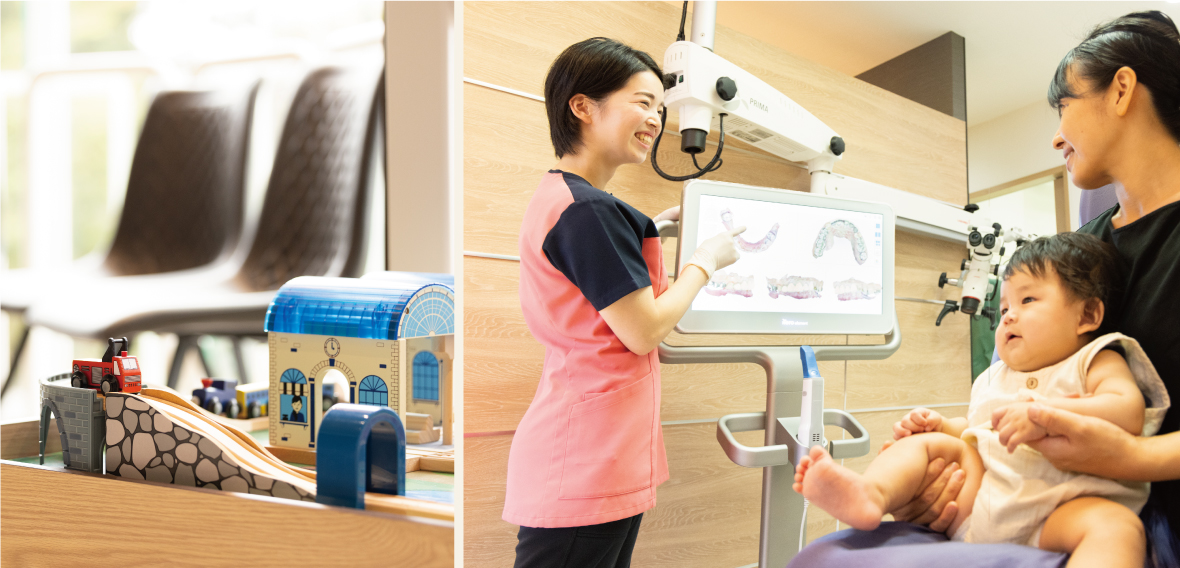 子供を抱えた母親に説明するスタッフ